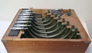 9 Mitutoyo Micrometer Set 2-12" Range .0001" Graduation Wooden Case With Masters. Fixed Price $900.00.
