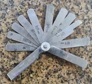 Mac TOOLS#FG13M -metric Sizes 0.05MM Thru 1.00MM, 13PC. Feeler Gauge Setusa. Fixed Price $16.00.