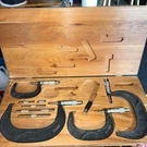 Scherr-tumico 9 Piece Micrometer Caliper Set In Wooden Storage Box. Fixed Price $150.00.