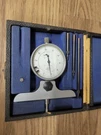 Swiss Compac Dial Depth Gage W/ 1.5 - 3 1/2" Rod .0001". Fixed Price $200.00.