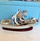 Lladro Paloma Boat Figurine Fishing #5215 Porcelain Sculpture W Box Repaired. Fixed Price $249.99.