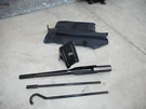 2006 Land Rover LR3 Tool Kit - Jack Handle, Tire Iron, Wheel Chocks KRK500160. Fixed Price $85.50.